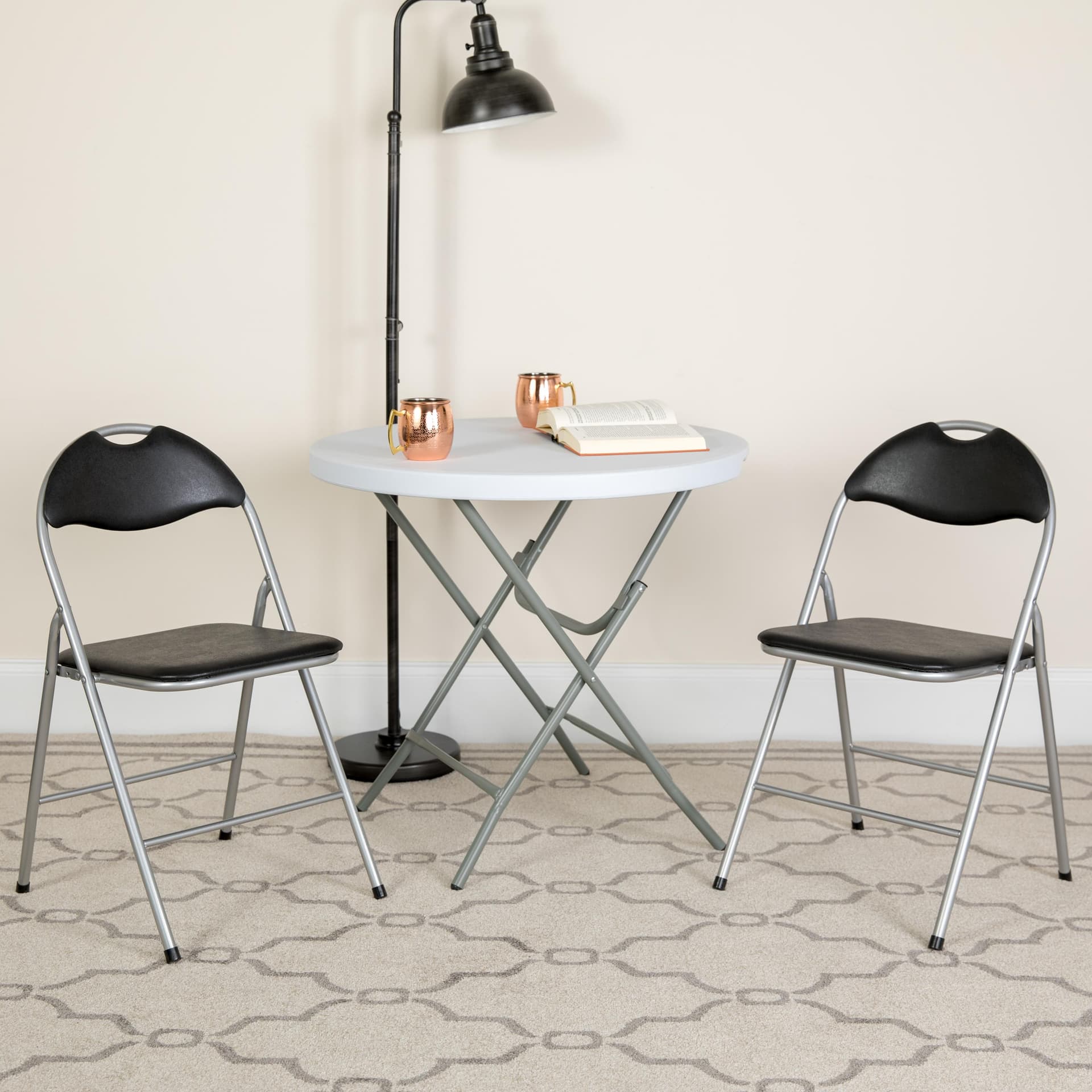 2 Pack 300 lb. Capacity Black Vinyl Metal Folding Chair with Carrying Handle