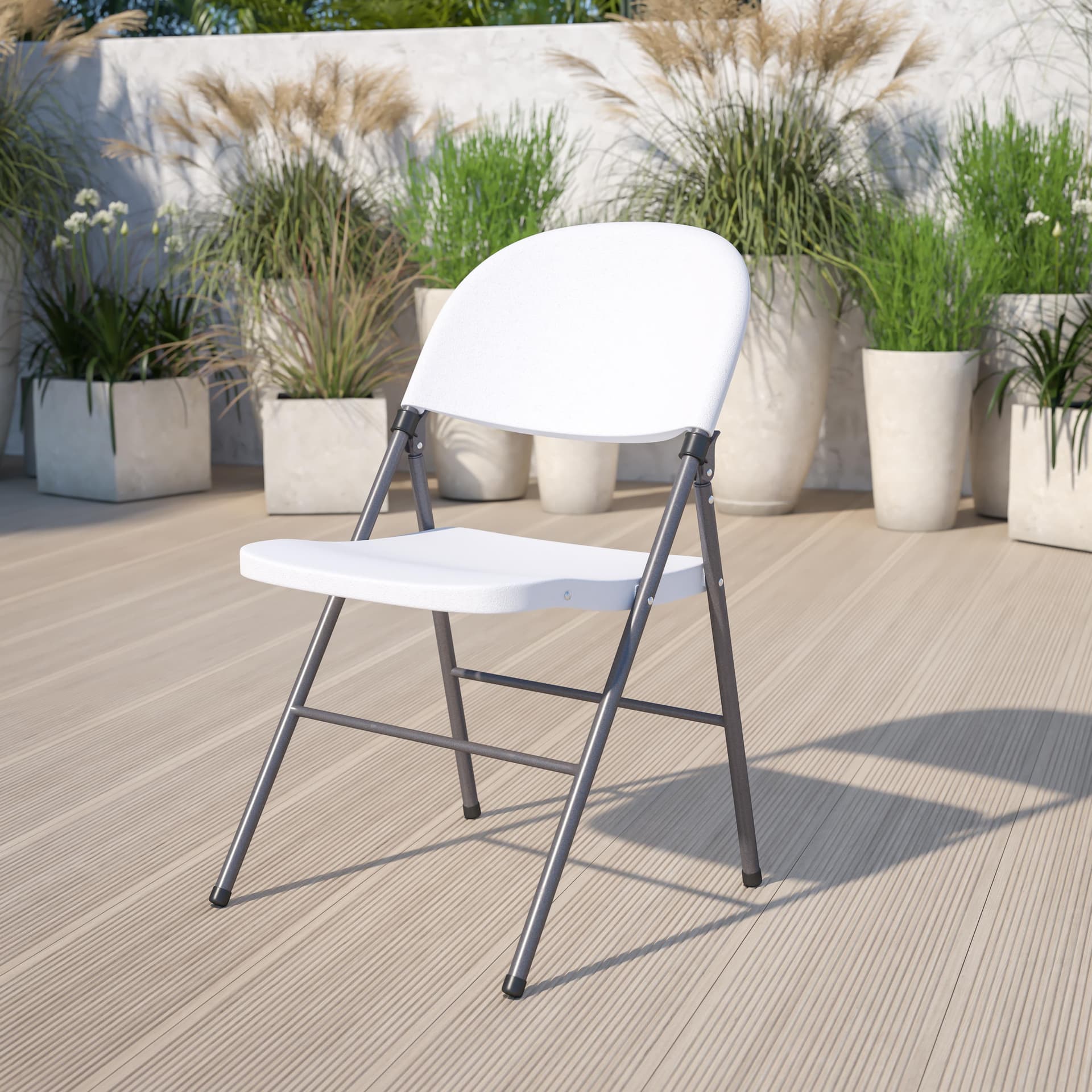 330 lb. Capacity Granite White Plastic Folding Chair with Charcoal Frame
